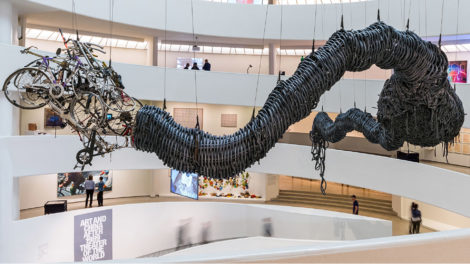 Dragon made of tires and bicycles suspended in the Guggenheim Museum