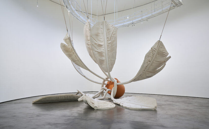 Claes Oldenburg and Coosje van Bruggen's Soft Shuttlecock , 1995 featuring Canvas, latex paint, expanded polyurethane foam, polyethylene foam, steel, aluminum, rope, wood, duct tape, fiberglass, and reinforced plastic, and nine feathers.